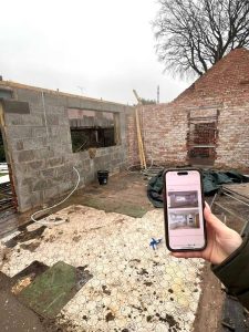 Beau Bijou Design case study Ben01 01 Phone in hand building site Greater Manchester