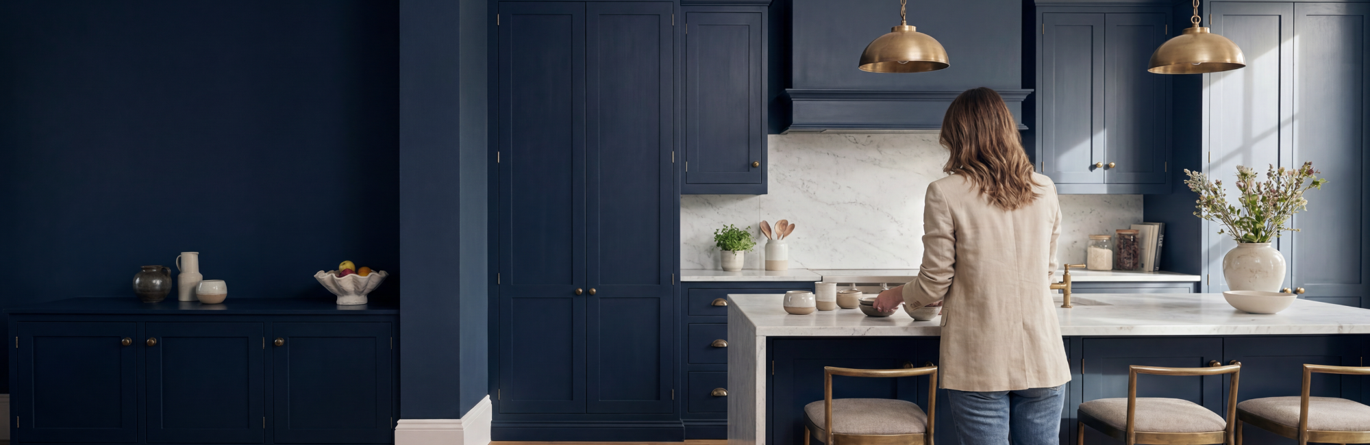 Navy shaker kitchrn with quartz worktops and island
