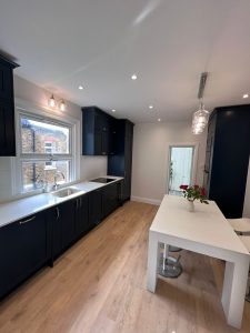 Beau Bijou Design - Hallas and Hill painted indigo shaker timber kitchen with quartz worktops