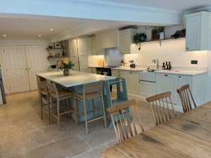 Completed Hallas and Hill kitchen. Mussel shaker timber with quartz worktops