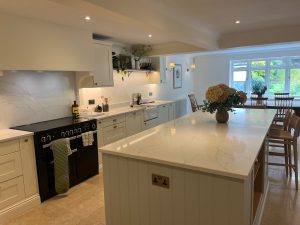 Completed Hallas and Hill kitchen. Mussel shaker timber with quartz worktops