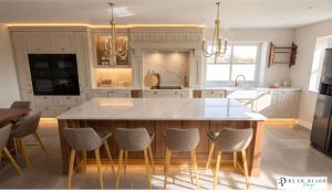 Beau Bijou Design. Hallas and Hill bespoke kitchen. musel and stained oak with Callacatta gold silestone worktops