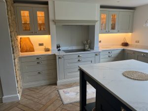 Beau Bijou design - shaker timber dove grey kitchen with bespoke mantle & quartz worktops